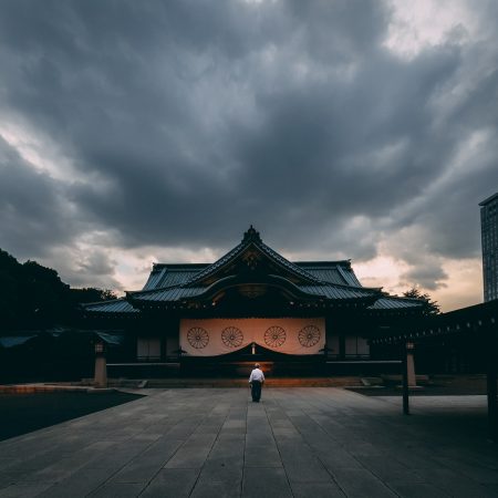 person standing in front of temple